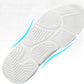 White rubber outsole with raised tread pattern and blue side traction line