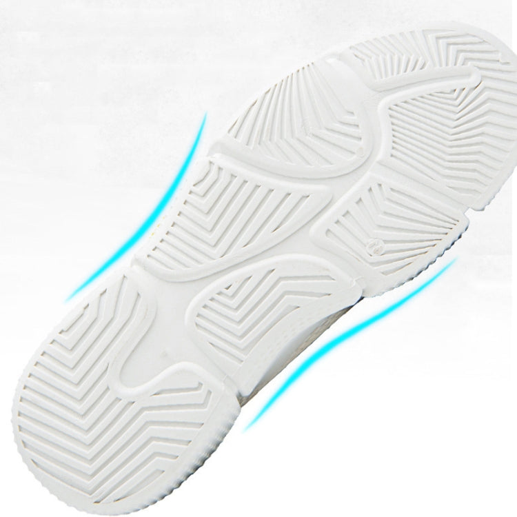 White rubber outsole with raised tread pattern and blue side traction line