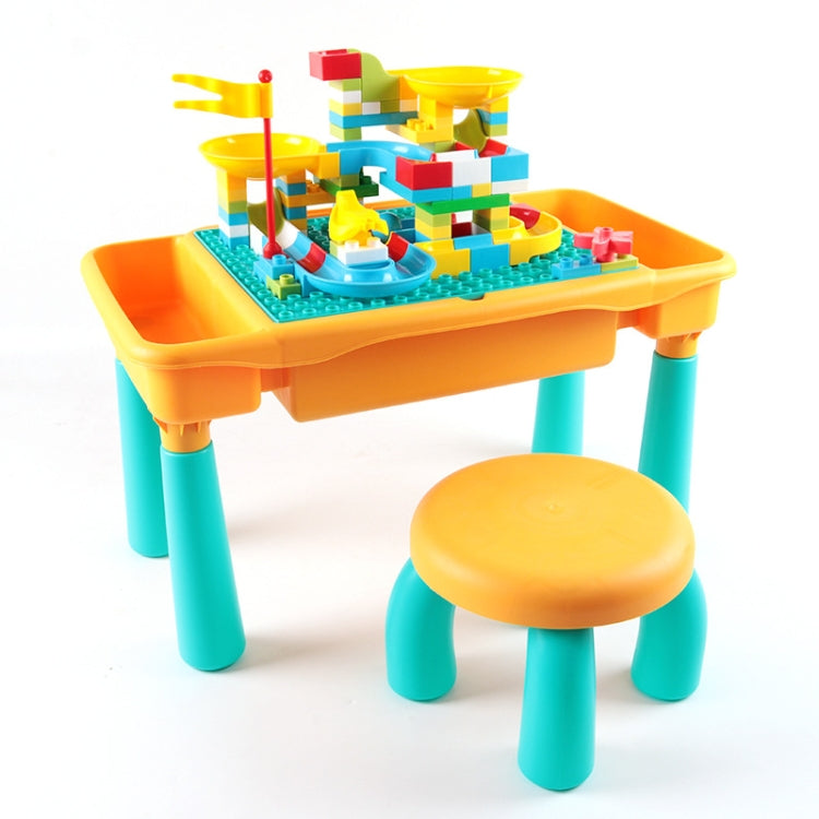 Colorful kids building table with teal legs, yellow top, and round yellow stool