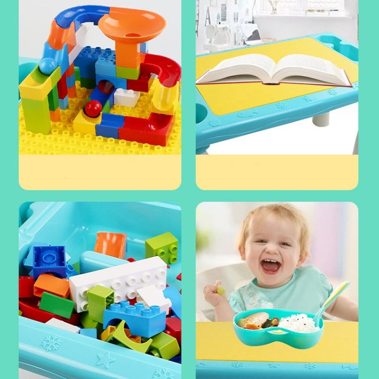 Colorful plastic blocks on a blue building table with a child play scene