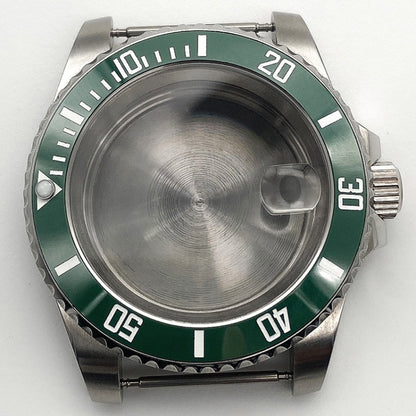 Stainless steel watch case with green rotating bezel and black minute markers