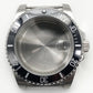 Stainless steel watch case with black rotating bezel and white minute markers