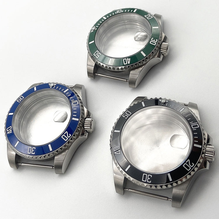 Set of stainless steel watch cases with green, blue, and black bezels