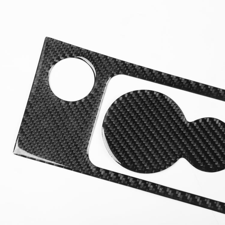 Black carbon-fiber cup holder trim sticker with round hole and oval insert