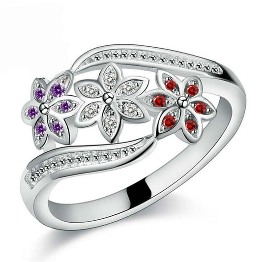 Silver-tone flower diamond ring with purple, red, and clear stone clusters