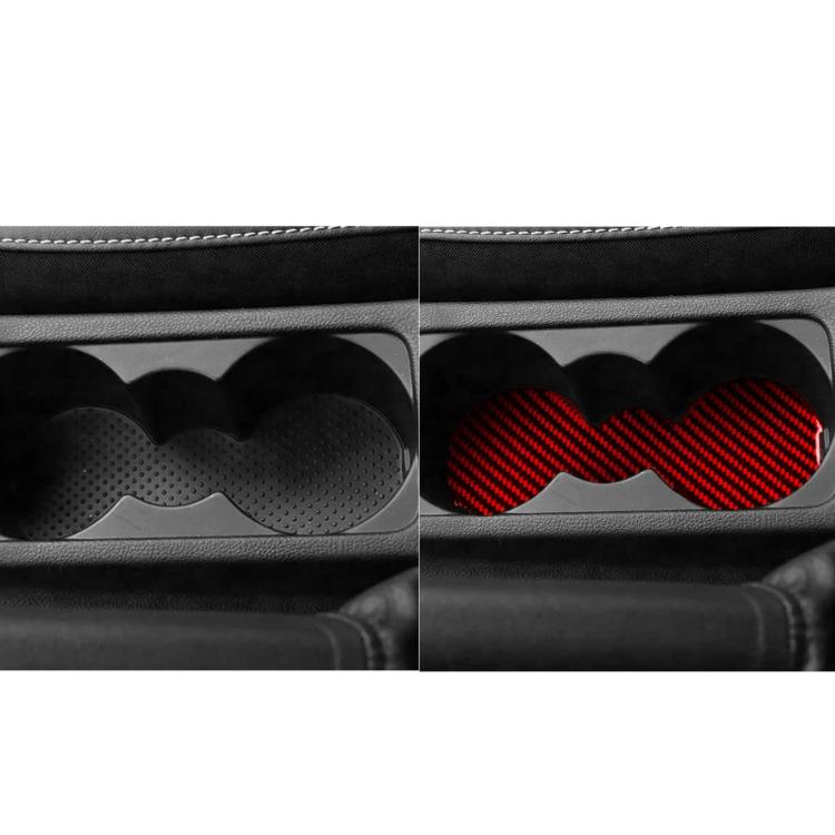 Side-by-side black and red carbon-fiber style dual cup holder inserts