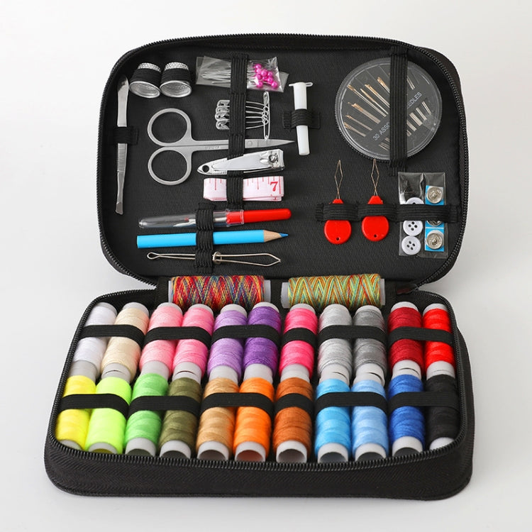 Black zippered sewing kit case with thread spools and sewing tools