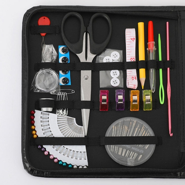 Sewing kit organizer with scissors, needles, measuring tape, thread accessories, and thread holder