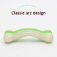 White arched nylon dog chew bone with green studded gripping surface