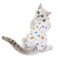 White sports-and-toy print cat recovery suit with neck hole and leg openings