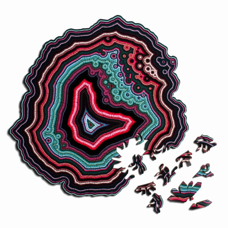 Wooden jigsaw puzzle with multicolor agate-style pattern and scattered puzzle pieces