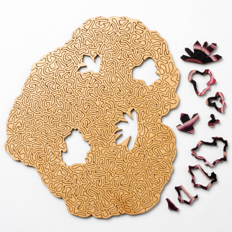 Wooden jigsaw puzzle with tan agate-style pattern and scattered puzzle pieces