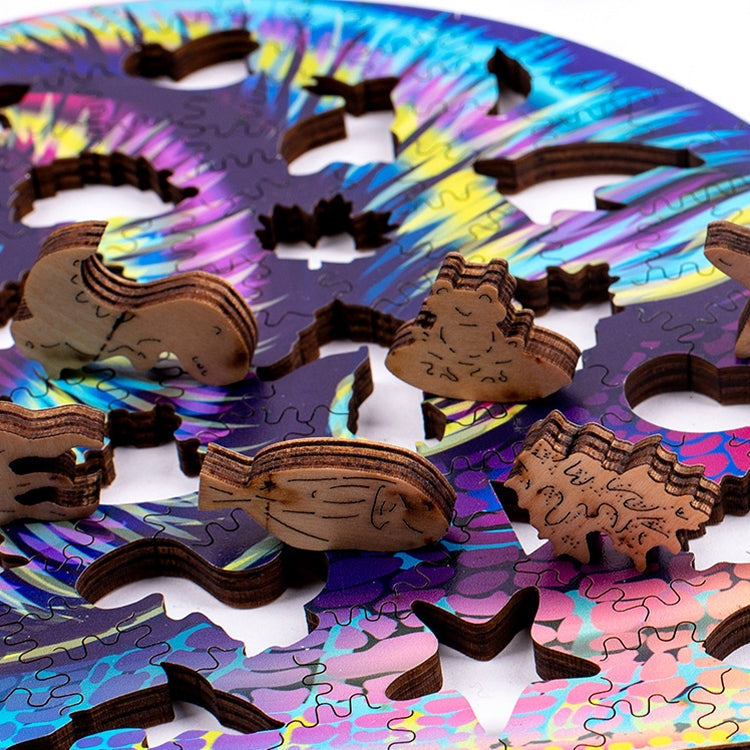 Assorted wooden animal puzzle pieces in rainbow color palette