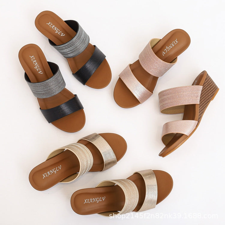 Platform wedge slide sandals in mixed colors: silver, black, and champagne, flat lay