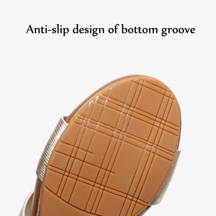 Close-up of brown wedge sandal outsole with anti-slip grid grip pattern