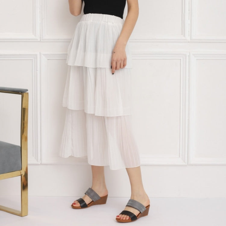 Gray strap platform wedge slide sandals on model with a white tiered dress