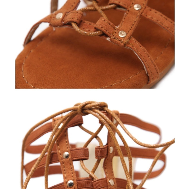 Brown sandals close-up: smooth sole, studded strap, and tied lace details