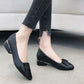 Women’s black cowhide mid-heel pumps with bow detail and block heel