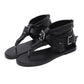 Black thong sandals with two silver buckle details and ankle strap, flat casual flip-flops