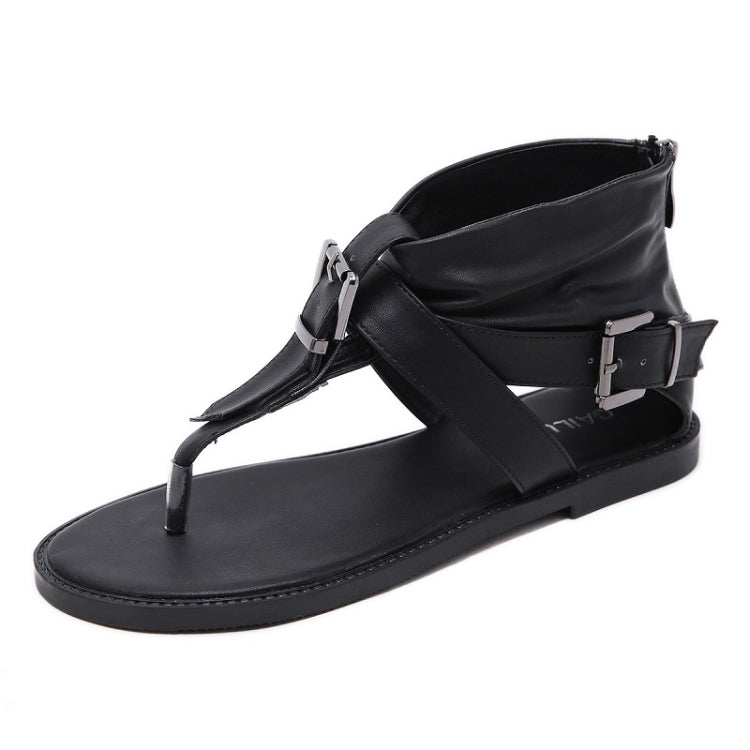Black thong sandals with metal buckle ankle strap and flat sole