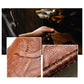 Leather slipper craftsmanship details showing textured grain and stitched seams