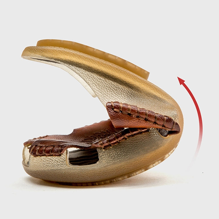 Brown leather slide sandals with tan sole and open-toe cut-out design, side view