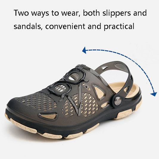 Black slip-on sandals with perforated pattern, adjustable strap, and beige outsole