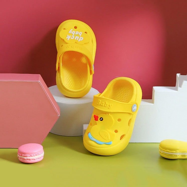 Children's yellow non-slip clogs slippers, front view with open toe and heel strap
