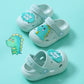 Children's light blue non-slip clogs slippers with open toe holes and smiley badge