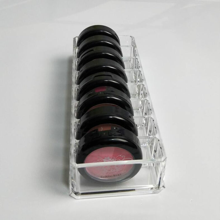 Clear acrylic organizer with vertical slots for stacked lipstick tubes