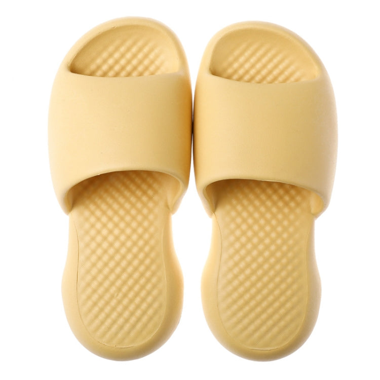 Yellow plastic slide slippers, textured footbed, open toe, thick padded sole