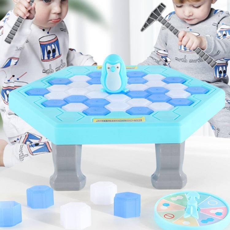 Blue penguin desktop interactive game table with penguin figure and hexagon blocks