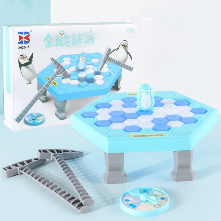 Blue penguin desktop interactive game table set with penguin figure and side launch ramps