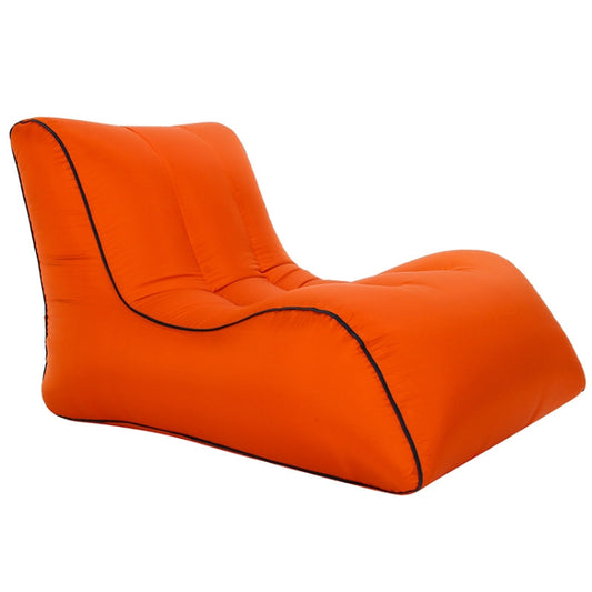 Single inflatable lounge sofa, orange with black piping and padded backrest.