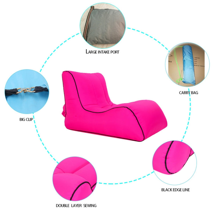 Magenta inflatable single lounge seat with black trim and padded backrest seams.