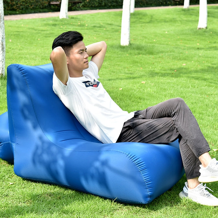 Blue inflatable single outdoor sofa with built-in backrest and armrest, folded for easy use