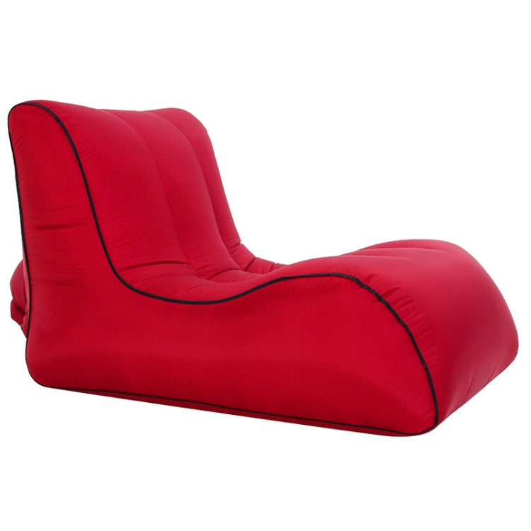 Single inflatable lounge sofa, red with black piping and contoured support.