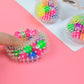 TPR vent ball decompression toy, translucent spiky ball with pink, green, purple, blue