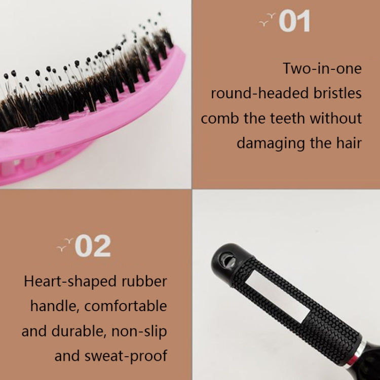 Hair brush comb close-up with pink head and rows of rounded bristles on textured handle