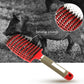Pink-ended hair brush comb held in hand; curved bristle head on beige textured handle