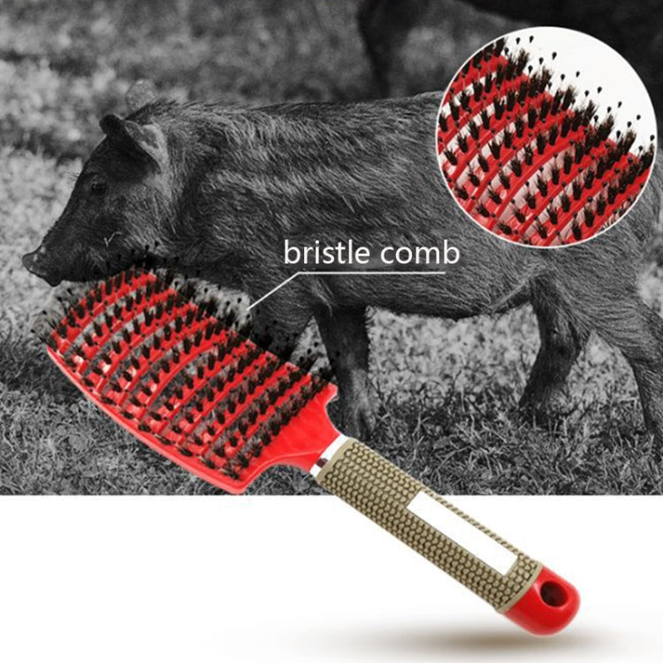 Pink-ended hair brush comb held in hand; curved bristle head on beige textured handle