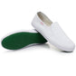 Unisex white slip-on sneakers showing green underside and beige inner lining