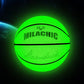 Fluorescent green reflective basketball, front view with black seam and holographic glow