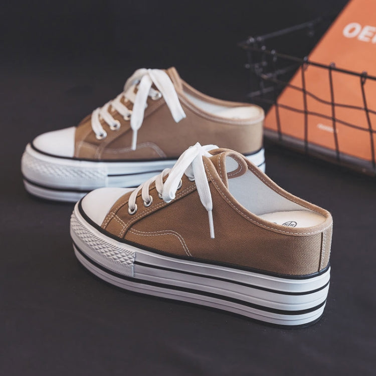 Women's thick-soled canvas platform slip-ons, tan/brown upper with white laces