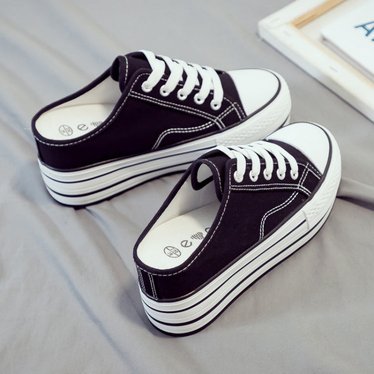 Women's thick-soled canvas platform slip-ons, pair view with dark canvas and white laces