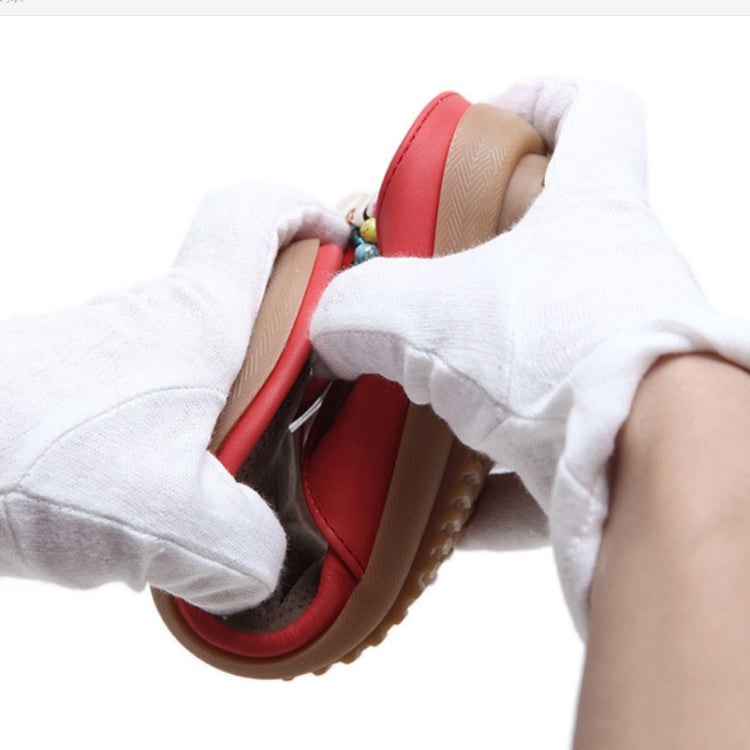Red slip-on sandals with white fabric lining and cushioned insole