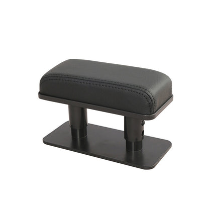 Dark gray PU leather center armrest pad with black base and rounded top