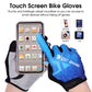 Blue and gray touch-screen cycling gloves beside a smartphone on a hand