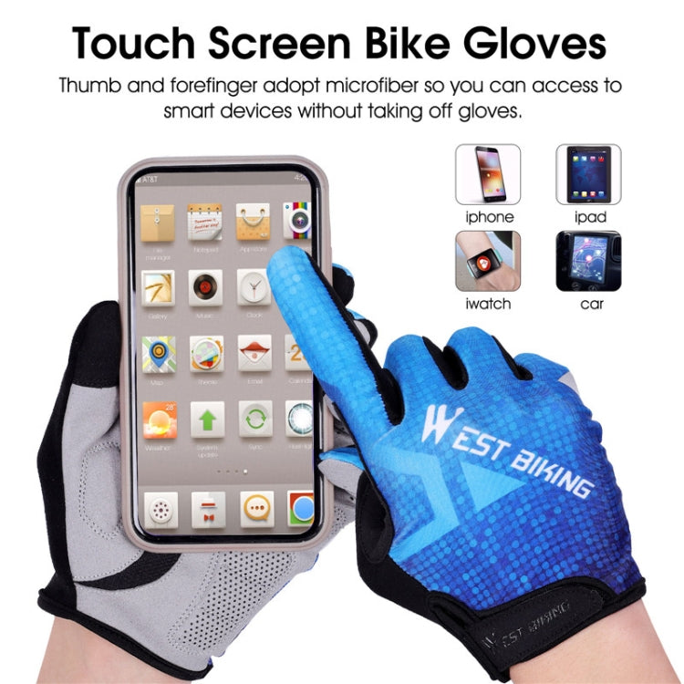 Blue and gray touch-screen cycling gloves beside a smartphone on a hand