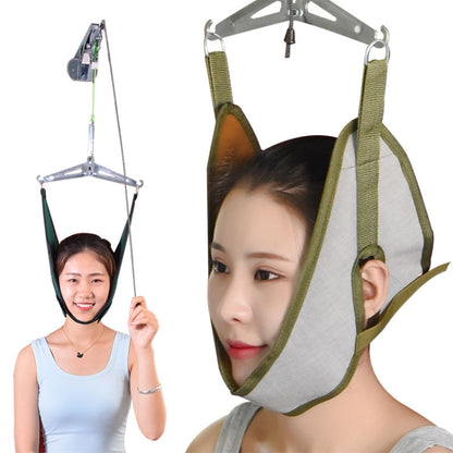 Cervical traction sling with gray head support and green straps, worn around neck